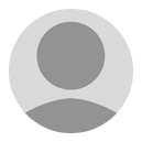 A gray circle with an image of someone in the middle.