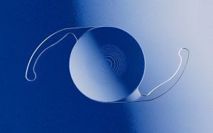 A blue background with a white bowl and two wires.